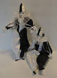 4.5 out of 5 stars. Pair Of Black And White Harlequin Porcelain Dolls Posable Jester Clown Porcelain Dolls Dolls Black And White