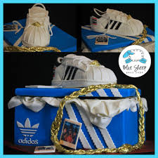 A traditional birthday cake has the words happy birthday written across it in icing. Addidas Sneaker Shoe Box Birthday Cake Run Dmc Style Blue Sheep Bake Shop