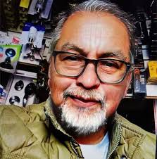 Who can fix a leak in the wall in my garage?