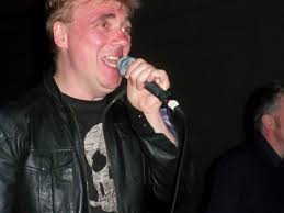 A laughing Paul McLoone of The Undertones, Punk Rock Bowli…