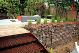 Tips for building raised garden beds with legs. Build Raised Flower Beds Benches And Gabion Fences Yourself Gabions In The Garden Interior Design Ideas Ofdesign