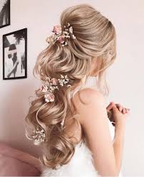 And who better to look to for some bridal style inspiration, especially when it comes to the ultimate finishing touch—your wedding hairstyle. 10 Wedding Hairstyles Ideas With Flowers For Long Hair By Ulyana Aster