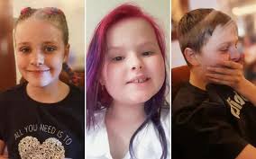 My little girl Lacey with her partner in crime, Henry.