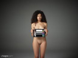 Curly haired babe Teti gets naked and teases with her big boobies 11 photos