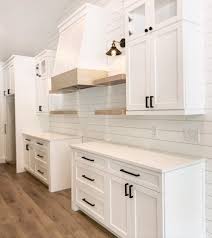 Beveled edges on traditional farmhouse cabinets add a level of sophistication that can be hard to find with this style. Sew A Pillow In 2020 Modern Farmhouse Kitchens Home White Cabinets
