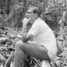 Tim Whitmore in contemplative mood in a clearing in the rain ...