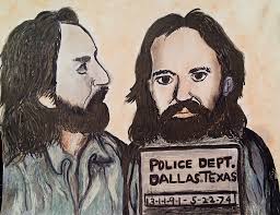 Older black and white photo of a grumpy man