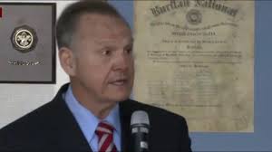 Are women in Alabama standing by Moore?