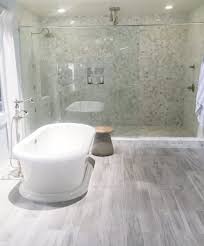 Marble look bathroom tile really elevates the look of a master bath. Finding Tile For A Bathroom Remodel With A Masculine Look Tile Outlets Of America