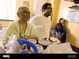 In this photo taken Dec. 18, 2009, Grandmother Lena McCline, left, laughs  with her grandson Chris McCline, right, who donated his kidney to Lena  earlier this week in Tucson, Ariz. Chris' aunt