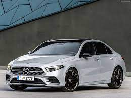A trio of circular air vents adds decorative flair to the center stack. Mercedes Benz A Class Sedan 2019 Pictures Information Specs