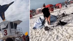 WATCH: Low Blue Angels flyover at Pensacola Beach sends items flying, shocks beachgoers