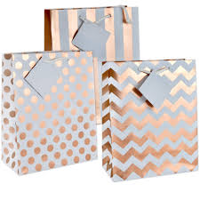 Gift bags are a lovely way to present gifts of all sorts for all occasions to someone special. 12 Gift Boutique Medium Metallic Rose Gold Gift Bags Polka Dots Stripes And Chevron Exquisite Designs Birthday Graduation Baby Shower Wedding Gift Bags Buy Online In Guatemala At Guatemala Desertcart Com Productid 89478519