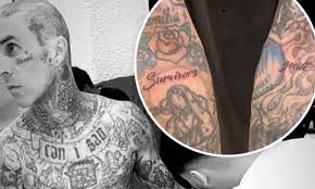 Hier gibt es markenqualiät zu günstigen preisen. Travis Barker Gets Survivor S Guilt Inked Onto The Inside Of His Elbows Daily Mail Online
