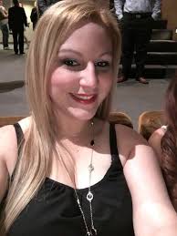 Can someone tell me or put a red cap and gown