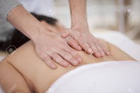 Cute Chubby Woman Getting A Back Massage At A Spa Stock Photo, Picture and  Royalty Free Image. Image 18192383.