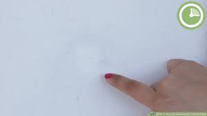 Place a paper towel on the other side of the fabric to keep the stain from bleeding through. 7 Ways To Remove Sharpie From A Painted Wall Wikihow Life