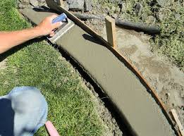Concrete landscape curbing or 'stamped concrete edging' has been installed in every climate in the united states and throughout the world. 17 Awesome Diy Concrete Garden Projects The Garden Glove Concrete Garden Concrete Landscape Edging Lawn Borders