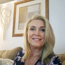 How to brighten up a dark entertainment center without painting it?