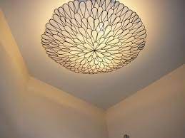 From there, you're ready to change the bulbs and get on with. Cool Idea Wall Hanging Turned Into Light Cover Diy Ceiling Ceiling Lights Ceiling Fan Light Fixtures