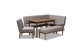 The walls are painted a subtle blue. Arvid Mid Century Modern Gray Fabric Upholstered 5 Piece Wood Dining Nook Set Ashley Furniture Homestore