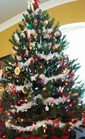 Tinsel Garland And Multi Lights Christmas Tree Garland Tinsel Garland Christmas Garland