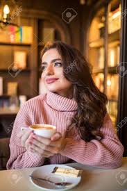 Urban woman drinking coffee happy smiling in new york city, manhattan. Young Beautiful Woman Drinking Coffee At Cafe Bar Stock Photo Picture And Royalty Free Image Image 97350378
