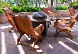 Here Are Some Lovely And Comfortable Wood Patio Chairs Around A Fire Pit Table This Is A Good Arr In 2020 Fire Pit Seating Outdoor Fire Pit Seating Fire Pit Furniture