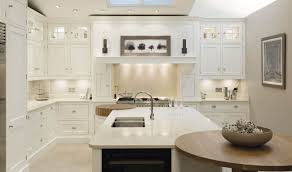 Shabby chic kitchen cupboards pair with stone, light blue, or pearl pink. Classic Painted Kitchen Tom Howley