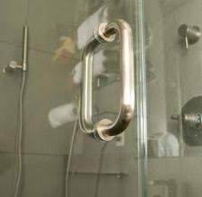 How To Get Water Spots Off Of A Shower Door Hunker Shower Door Cleaner Glass Shower Shower Doors