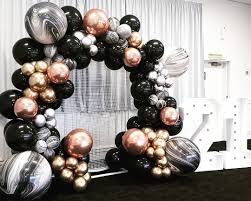 A 30th birthday cocktail event decorated in black & white stripes with chic gold accents! Black And Rose Gold Party Decorations Novocom Top