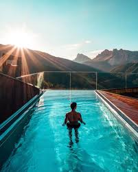 Jeremy Austin On Instagram Sunrises At The New Forestis Dolomites Overlooking The Breathtaking Peaks Of The Dolomites U In 2020 Dachterrasse Mit Pool Pool Dolomiten