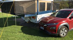 Stop by and see why our customers say, that's a good camper, paw paw! Tow Story Hauling A Camper Trailer With An Electric Kona