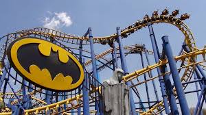 six flags is taking the idea that people will recognize these comic book properties and want to dive into their parks to ride water park superhero theme riding