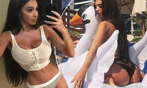 Chloe Khan flaunts her surgically-enhanced assets in Dubai | Daily Mail  Online