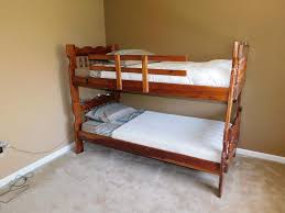 Is the top bunk properly designed to keep kids from rolling off it while they're sleeping? Lot 72 Twin Bunk Beds Complete Auction By Sac Valley Auctions
