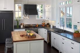 Many homeowners believe that the only solution to a small space is white cabinets, but this kitchen proves otherwise. Black Refrigerator Transitional Kitchen Artistic Designs For Living