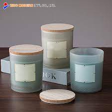 We offer a large selection of glass votive holders, square votive holders and these small holders are made of heat tempered glass to stand the test of time if properly maintained. China Wholesale Custom Modern Frosted Glass Candle Jar With Wooden Lid China Glass Candle Jar With Lid And Frosted Glass Candle Jar With Lid Price