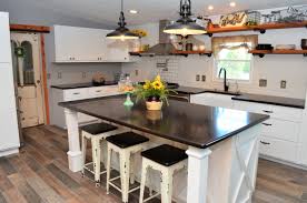 The overall classic look of the design is achieved with light quartz countertops and backsplashes. The History And Popularity Of White Cabinets Bailey Town Usa Blog
