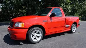 Image result for Coral Red 1999 Truck