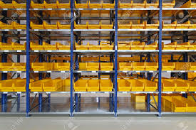 Yellow Plastic Bin Trays At Shelf In Warehouse Stock Photo Picture And Royalty Free Image Image 16574472