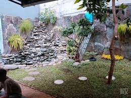 Fitur air selalu memiliki dampak yang kuat dalam lanskap. Kolam Tebing Air Terjun Bagian Dalam Rumah Konstruksi Dan Taman 769449312