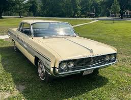 Image result for Cameo Cream 1962 Buick