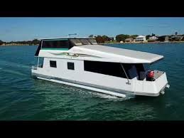 The layout starts with a large family living area in the front with amenities such. Video Custom Houseboat For Sale