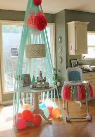 Diy First Birthday Decoration At Home Diy Adventure Themed Birthday Party Crepe Paper Teepee Diy Birthday Decorations Tribal Birthday Party First Birthday Parties