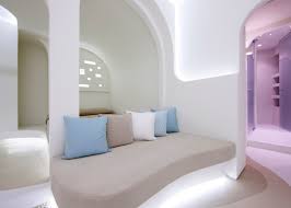 Klab Decks Out Santorini Hotel In Smooth Curves To Mimic The Cave Like Houses On The Greek Island Hotel Interiors Santorini Hotels Hotel