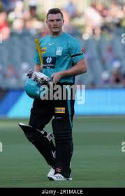 Adelaide, Australia, 23 December, 2021. Max Bryant of Brisbane Heat caught  out by Wes Agar of Adelaide Strikers during the Big Bash League cricket  match between Adelaide Strikers and Brisbane Heat at The Adelaide Oval