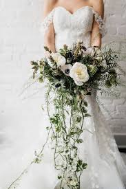 What wedding flowers did you use (or are you planning to use) in your bouquet? Emerald Green Inspired Bridal Inspo Emerald Green Wedding Theme Cascading Wedding Bouquets Green Wedding Bouquet