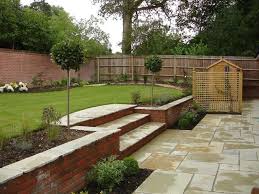 Stylish Sloping Garden Landscaping Ideas How To Cope With A Sloping Garden Alda Landscapes Sloped Garden Back Garden Design Sloped Backyard
