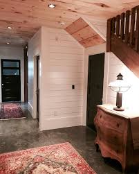 This Is Our Lower Level Hallway It S So Pretty And Doesn T Get Seen Often Raw Pine Ceilings Sea Concrete Floors Seal Concrete Floor White Shiplap Wall